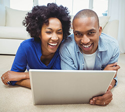 couple looking at laptop