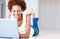 female looking at laptop