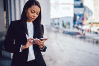 young lady looking at phone